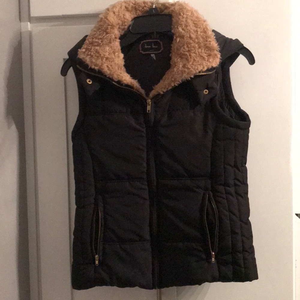 Black puffer vest with faux fur trim and hood